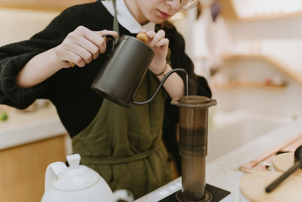 Small business owner at work in a cafe