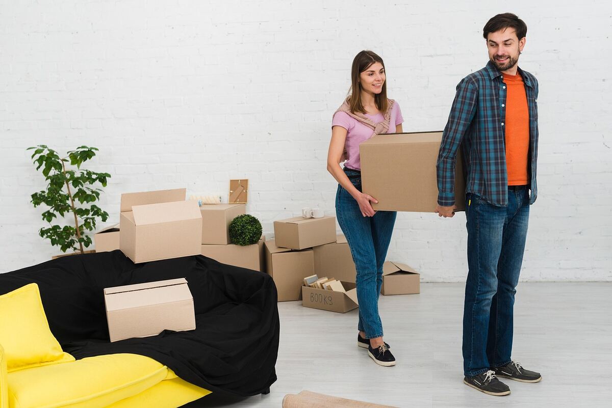 Young couple moving into their first home